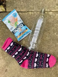 homemade diy dog toy you made from a plastic bottle. Homemade treat dog toy